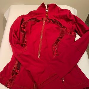 Red lululemon zip up with snakeskin pattern